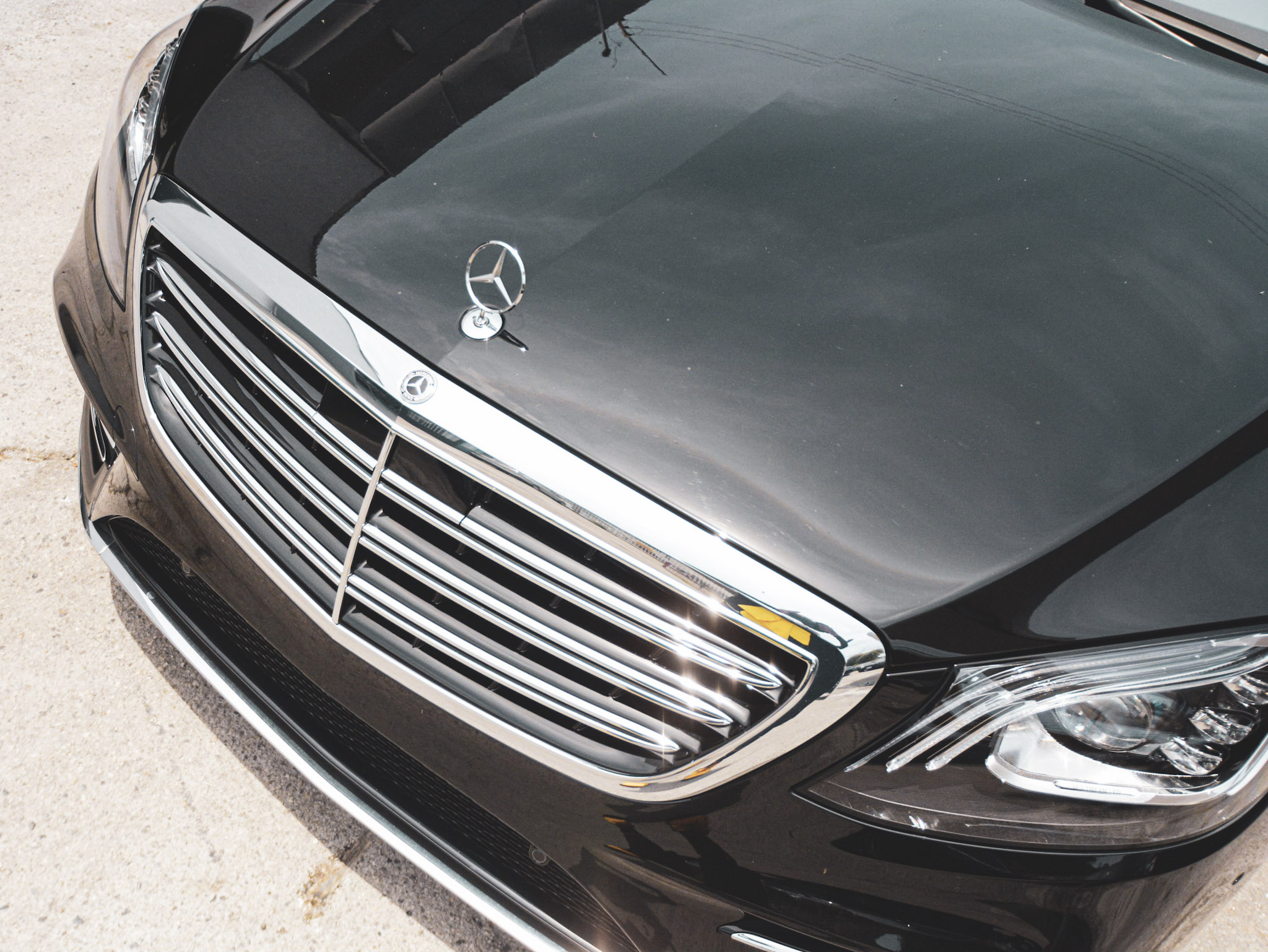Detailed Mercedes-Benz front finish photographed at One Stop Collision Center in Tujunga